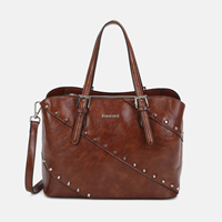 Bolso mano Freeda cuero